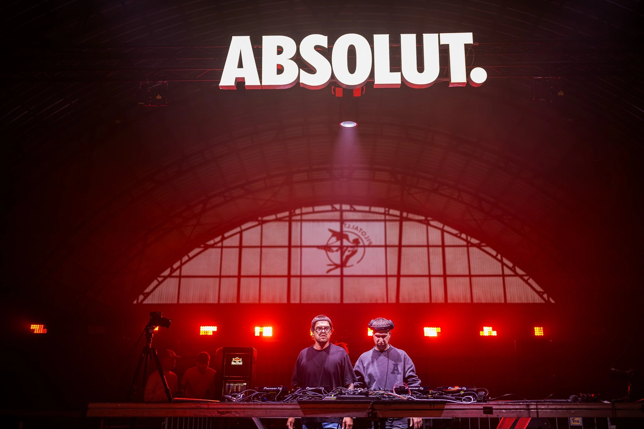 The illuminated stage and arched hangar roof